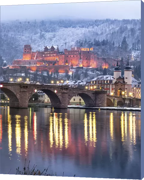 Heidelberg castle and Old Bridge illuminated in winter, Baden-Wurttemberg, Germany