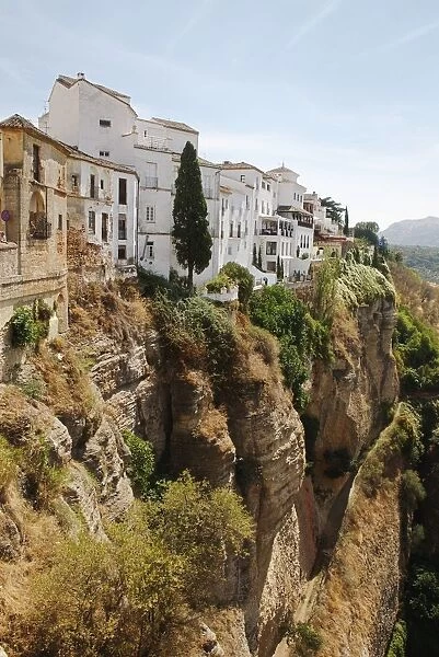 Prints of Spain Andalucia Pueblos Blancos row of houses built on top of cliff overlooking edge