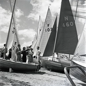 National 12 sailing dinghies on a Devon beach