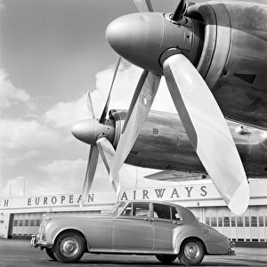Heathrow Airport Canvas Print Collection: Bentley car and aircraft propellers a087923