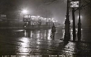Policemen Collection: The Embankment, London on wet night with Policeman and Trams