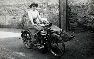 Bikers Collection: Two ladies on a 1914 Triumph motorcycle