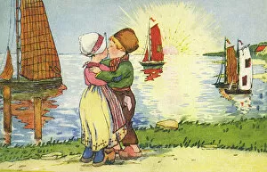 Clogs Collection: Young Dutch boy and girl share a kiss at sunset