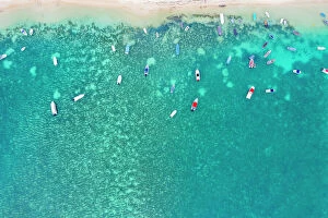 Indian Ocean Collection: Aerial by drone of boats in the turquoise water of lagoon front of Mont Choisy beach