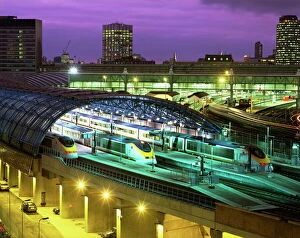 Stations Photographic Print Collection: Aerial view over the modern Eurostar terminal and trains at dusk, Waterloo Station