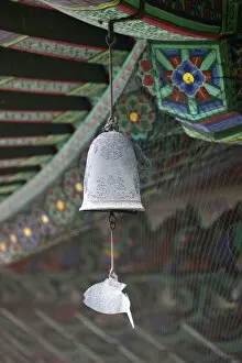 Temples Collection: The fish-shaped chime on the Buddhist wind bell, honors those creatures which never close