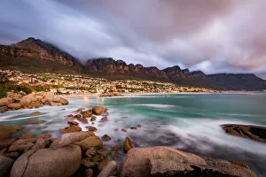 Cape Town Framed Print Collection: Long exposure at sunset at Camps Bay with cloud over Table Mountain and the Twelve Apostles