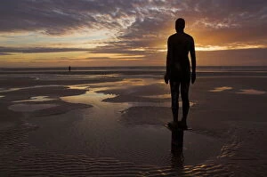 Usk Poster Print Collection: Another Place statues by artist Antony Gormley on Crosby beach, Merseyside