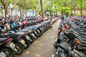 Saigon Collection: Rows of motorbikes parked in central Ho Chi Minh City (Saigon), Vietnam, Indochina