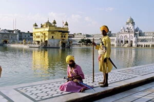 Indian Architecture Fine Art Print Collection: Sikhs in front of the Sikhs Golden Temple
