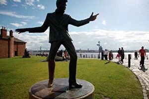 Monuments and landmarks Metal Print Collection: The statue of Billy Fury by Albert Dock and the Mersey River, Liverpool