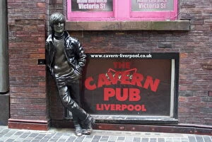 Liverpool Photographic Print Collection: Statue of John Lennon close to the original Cavern Club, Matthew Street