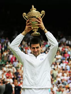 Rafael Nadal Photo Mug Collection: 2011 Wimbledon champion Novak Djokovic
