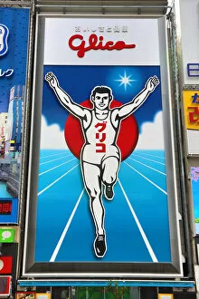 Related Images Greetings Card Collection: Glico Man advertising poster of a running man, Osaka, Japan