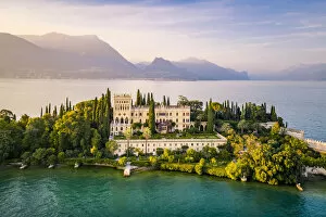 Sunset landscapes Fine Art Print Collection: Aerial view of Isola del Garda with Villa Borghese, on the west side of Garda Lake, near Salo town