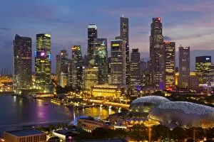 Usk Collection: Asia, Singapore, Singapore Skyline Financial district illuminated at dusk