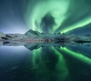 Stars Collection: Aurora borealis over a lake near Svolvaer, Lofoten islands, Norway