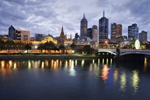 Sky Scraper Collection: Australia, Victoria, Melbourne. Yarra River and city skyline by night