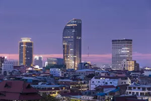 Central Cambodia Collection: Cambodia, Phnom Penh, elevated city skyline, dusk