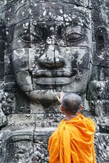 Oriental Flavours Metal Print Collection: Cambodia, Siem Reap, Angkor Wat complex. Monks inside Bayon temple (MR)