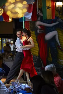 Dance Collection: A couple of tango dancers perform a live-show in a restaurant of La Boca, Buenos Aires