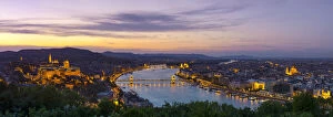 Aerial Views Fine Art Print Collection: Elevated view over Budapest & the River Danube illuminated at sunset, Budapest