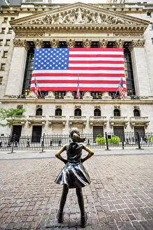 America Fine Art Print Collection: 'Fearless Girl'bronze sculpture by artist Kristen Visbal across from the New York Stock Exchange