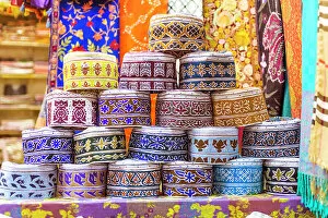 Textile Collection: Oman, Muscat. Souvenirs for sale at a shop in the old souk of Mutrah