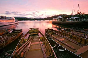 Oars Collection: Rowing boats at Waterhead Ambleside on Lake Windermere at sunset in the Lake District UK