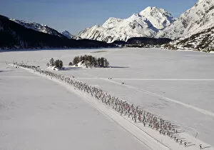 Related Images Collection: An aerial view shows cross-country skiers racing during Engadin Ski Marathon in village