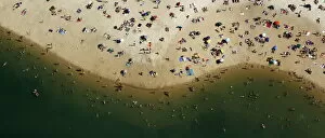 Belgium Pillow Collection: An aerial view shows people cooling off at a beach on the shores of the Silbersee lake