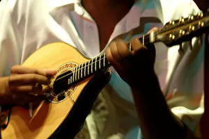 Music Canvas Print Collection: A member of Choros Scenarium group plays a Mamdolin guitar at Scenarium bar in Rio de Janeiro