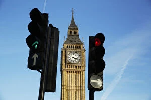 Red Arrows Photo Mug Collection: Red and green traffic lights direct traffic in front of the Big Ben bell tower at the