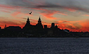 Weather Collection: The sun rises across the river Mersey over Liverpool