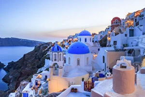 Blue Hour Collection: Greece, Santorini, Oia. Sunset on coastal town