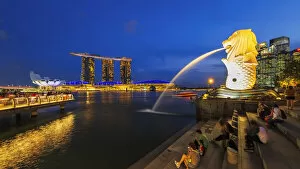 Marina Bay Sands Hotel Collection: Merlion fountain and Marina Bay Sands at night, Singapore