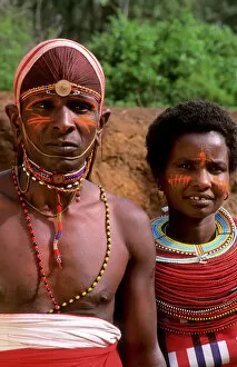 Kenya Collection: Msai tribe people couple in costume traditional dress in jungles near hut near Kenya Africa