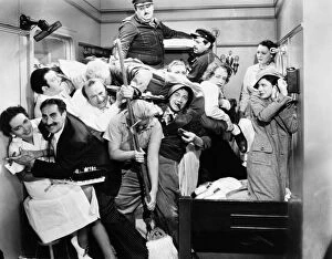 Film Collection: THE MARX BROTHERS, 1935. Some of the ships crew join the Marx Brothers in their cabin in A Night