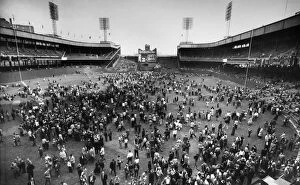 Related Images Photo Mug Collection: NEW YORK: POLO GROUNDS. Crowd of baseball fans pouring onto the field at the Polo Grounds in New