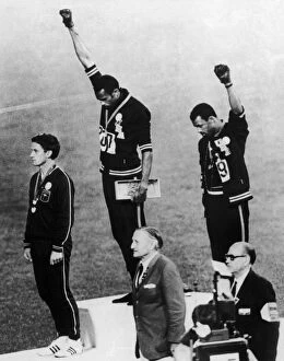 Olympic Medal Winners Photographic Print Collection: OLYMPIC GAMES, 1968. American runners Tommie Smith (center) and John Carlos (right)