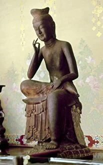 Photo Collection: Red pine wood statue of Buddha of the Future, called Miroku Bosatsu or Maitreya, at Koryu-ji