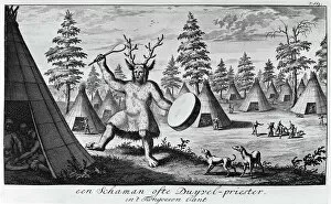 Forest artwork Collection: SIBERIA: SHAMAN. A shaman of the Tungus people of Siberia, with antlers and ritual drum