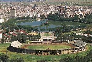 Madagascar Collection: Madagascar, Aerial view of Antananarivo Stadium and Lake Anosy with war memorial