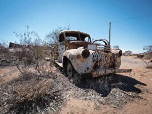 Chris Beavon Cushion Collection: Abandoned car in Outback Australia