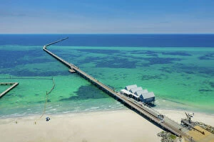 Landscape paintings Metal Print Collection: Aerial view of Busselton Jetty on a sunny day with tourists in front of souvenir shop in