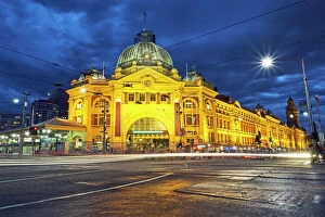 Melbourne Collection: Facade of Flinders Street station illuminated at night