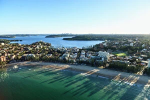 Sydney Collection: Manly beach and a distant Sydney skyline