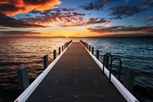 Port Phillip Bay Collection: A pier leading to the sunset