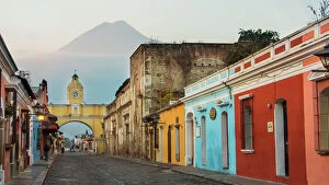 Mission Architecture Fine Art Print Collection: Agua Volcano and Arco de Santa Catalina (Santa Catalina Arch) in Antigua Guatemala