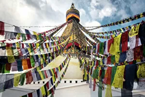 Nepal Collection: Prayer flags with the Boudhanath Stupa in Kathmandu, Nepal